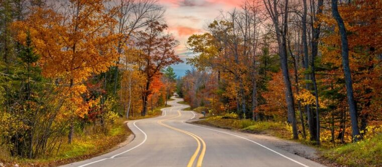 fall foliage on the road on the way to fall festivals in Wisconsin